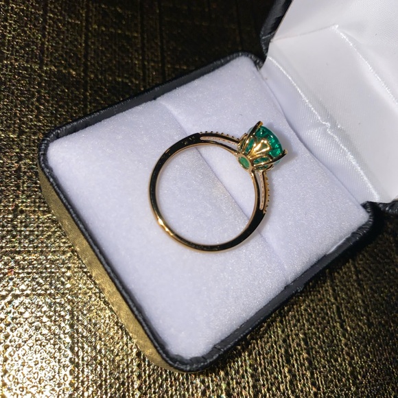 2.6 ct. t.w. Emerald and 1/10 ct. t.w. Diamond Ring in 10K Yellow Gold - Picture 3 of 3